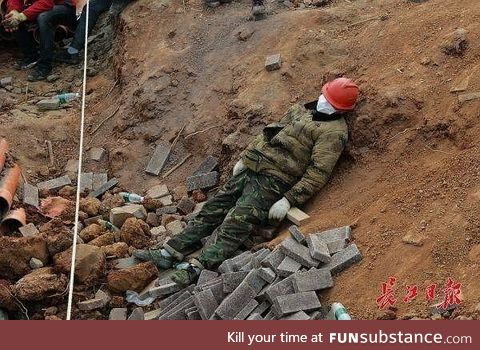 A Chinese worker on the construction site for Huo Shen Shan hospital, finished in 9 days