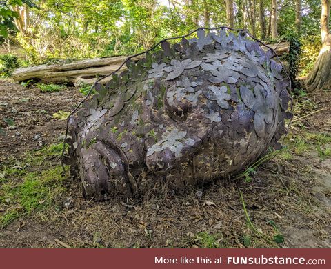 A metal sculpture found in the local woods