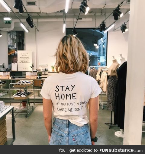 Belgian employee of & Other Stories, part of H&M, protesting the fact that she has to