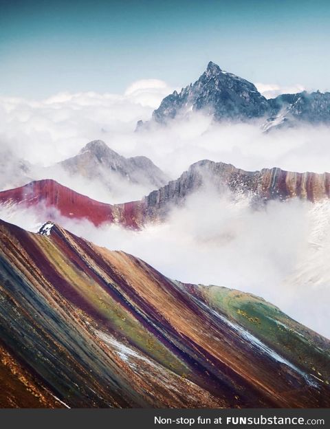 Clouds over Rainbow Mountain in Peru