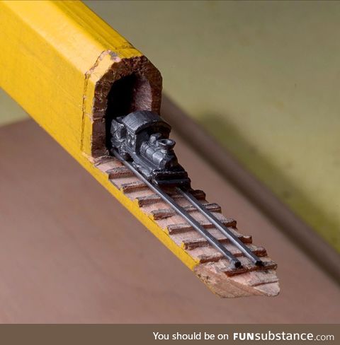 This carving of a train in a pencil 