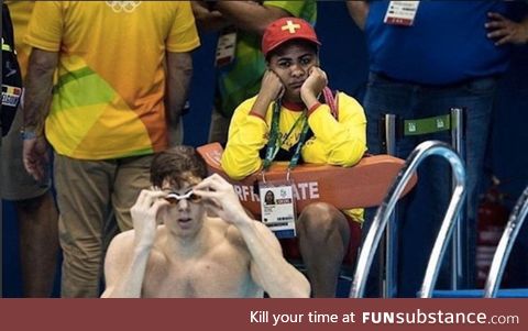 If you ever feel useless, this is the lifeguard at the swimming Olympics