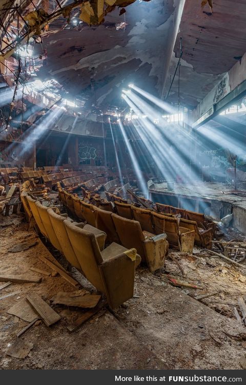 Light Rays Shine in an Abandoned Theater