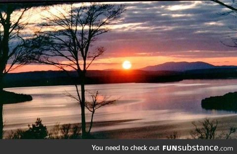 Sunset from my parents deck. When they moved we found boxes of disposable cameras. I had