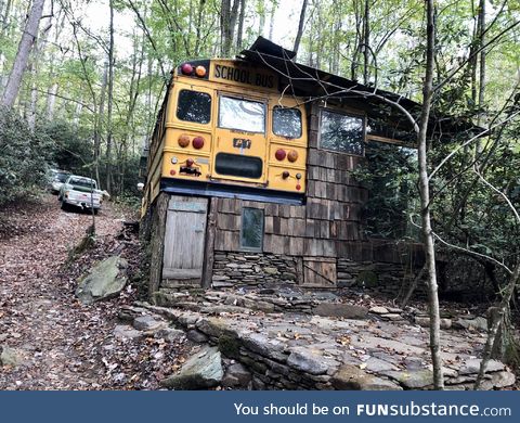 School bus converted into part of a house