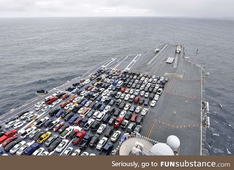Sailors' Cars parked on the USS Ronald Reagan while it changes home ports in 2012
