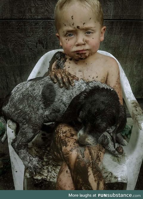 Just a boy and his hound dog puppy not ready for a bath. My son, Jude and his dog he