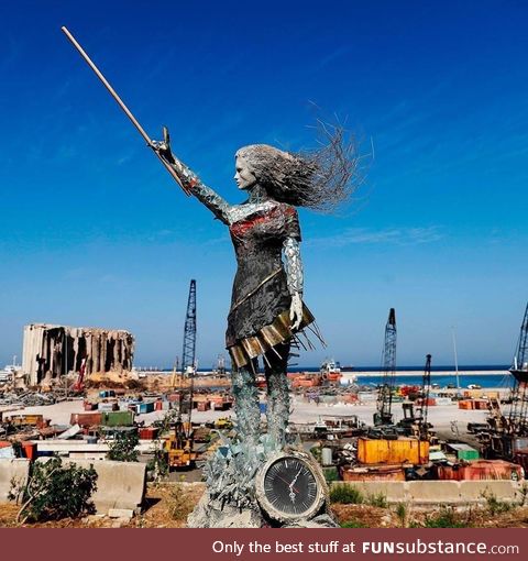 The Beirut lady statue , made of some of the debris of the explosion happened that back