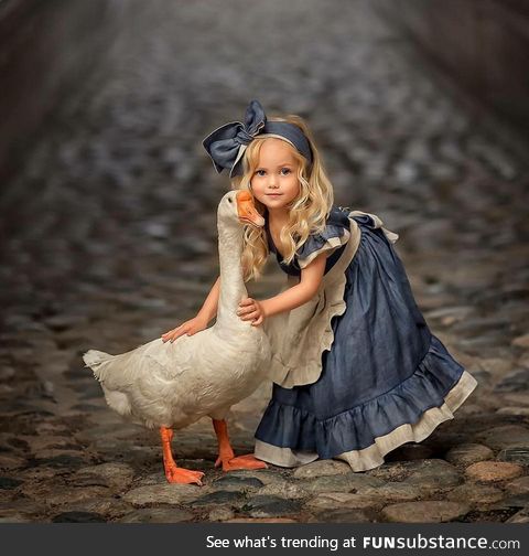A Girl and a Goose,the eyes are way too soulful..!!