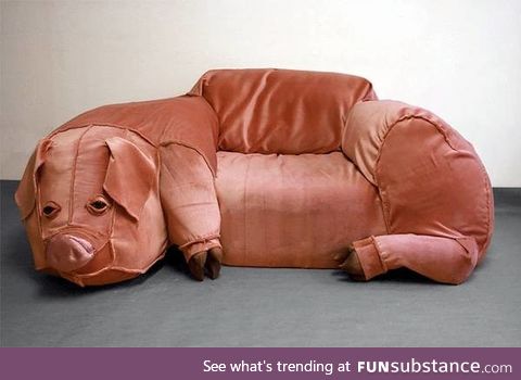 The pig couch even smells of bacon, naturally