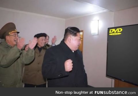 Civilians celebrate as Kim Jong Un invents a new device called television, 2014