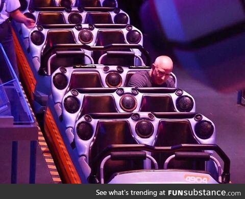 Jeff Bezos riding Space Mountain alone