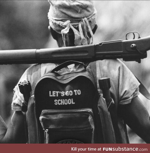 American child prepares to go to school in South Central, Los Angeles, 1992