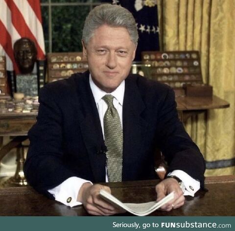 President Bill Clinton and Monica Lewinsky together at his desk in the Oval Office. 1995