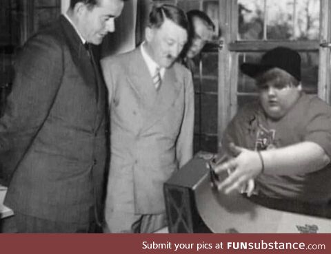 Adolf Hitler observing a TechDeck trick Circa 1940