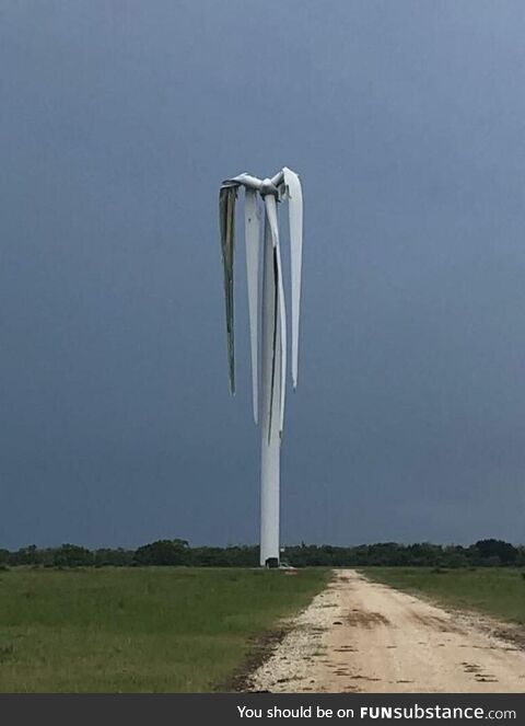 Lack of wind causing a wind turbine to wilt