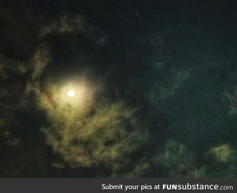 Clouds and moon make it look like it is all in space