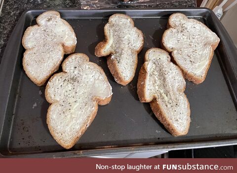 Bread got squished on the way home from the store. Now we are having Garlic Ghosts :)