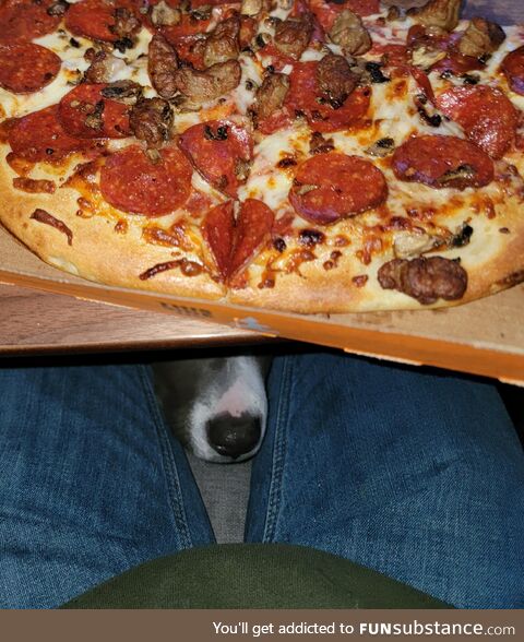 Waiting on that one piece of stray sausage to fall off a slice