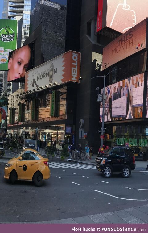 Took a panorama picture on Times Square and it shrunk the cars