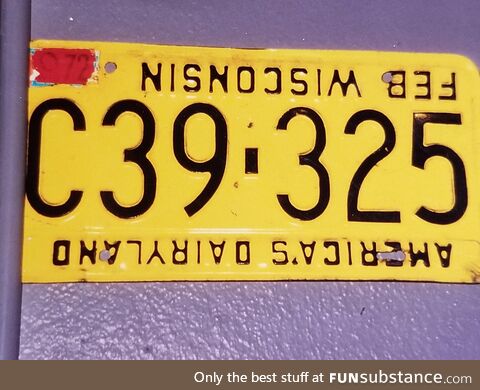 My dad had this plate on his business vehicle many years ago, he was never sure which way