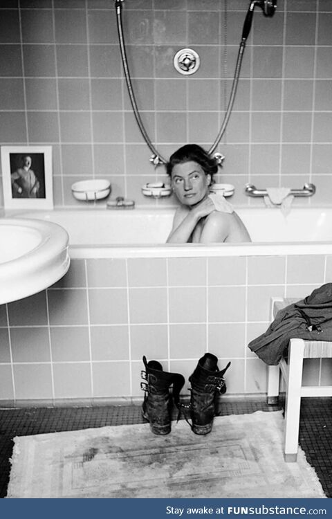 Journalist Lee Miller in Hitler's bathtub, April 30th, 1945