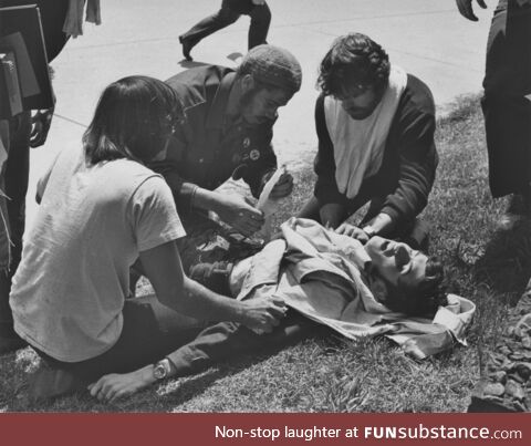 Ohio National Guard open fire on peaceful prostesters kill 4 at Kent State May 4th 1970
