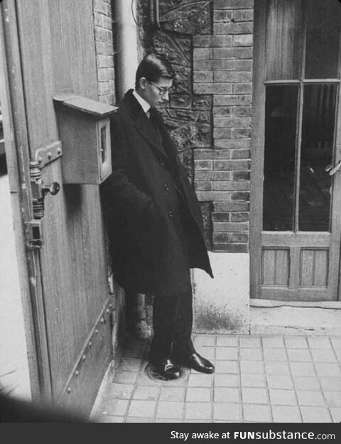 Yves Saint Laurent mourning at his mentor Christian Dior’s funeral