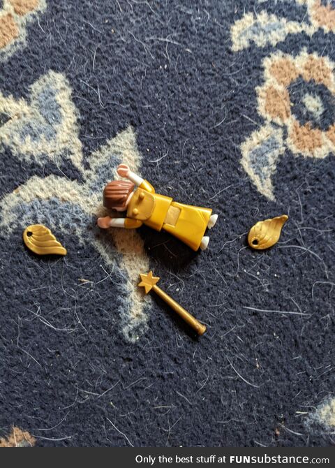 My toddler had no mercy for the angel from her toy nativity scene