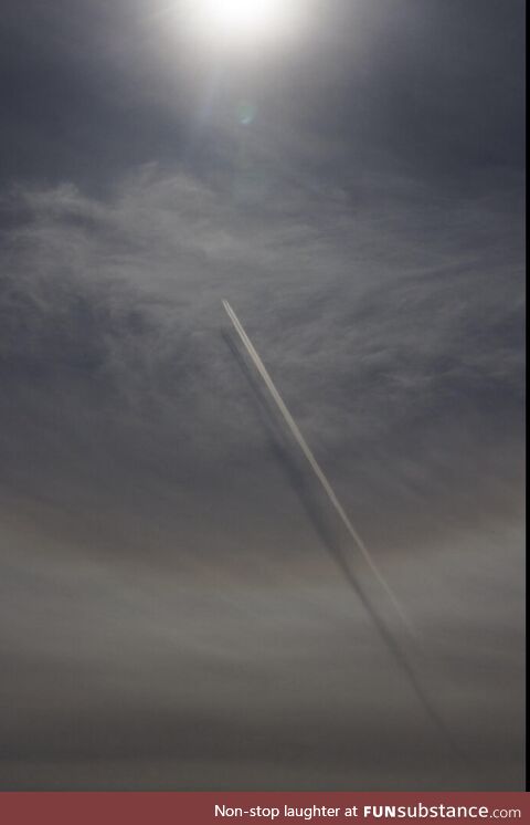 Our most recent total solar eclipse. Shadows cast by contrails on clouds. Montreal area