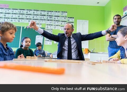 The French Prime minister winning a game of dominoes