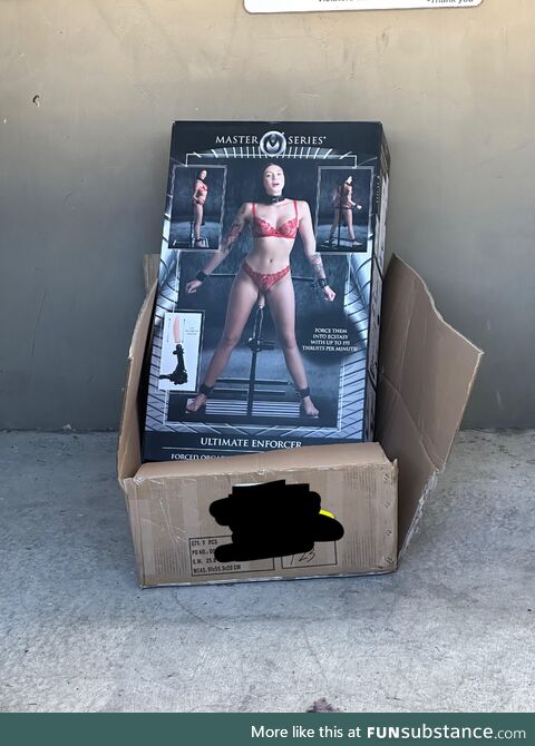 Empty boxes left near a dumpster