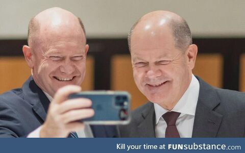 German Chancellor Olaf Scholz and U.S. Senator Chris Coons