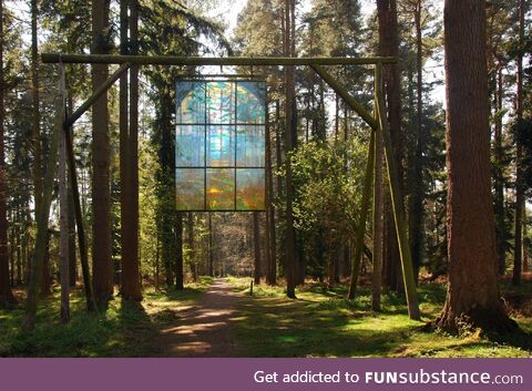 Stained glass window in a forest