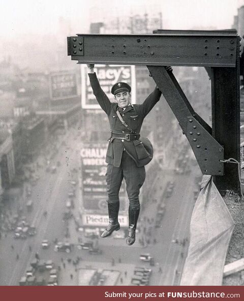A NYC policeman hanging out (1920)