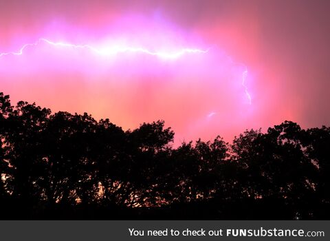 Took a picture of the sunset right as lightning struck