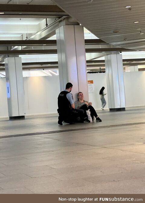 Aussie cop comforts crying woman