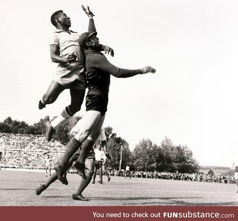 Pelé (5'8") jumps over the legendary goalkeeper Lev Yashin (6'2")