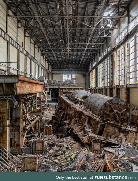 Abandoned power plant after a failed demolition.[OC]