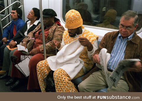 Man crocheting on the subway