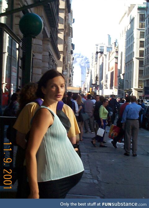 A pregnant woman not yet realizing a terrorist attack was In progress