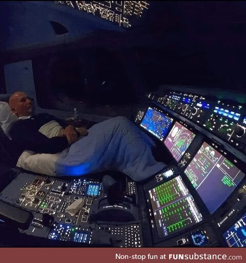 A pilot relaxing in a “controlled rest” during an overnight flight