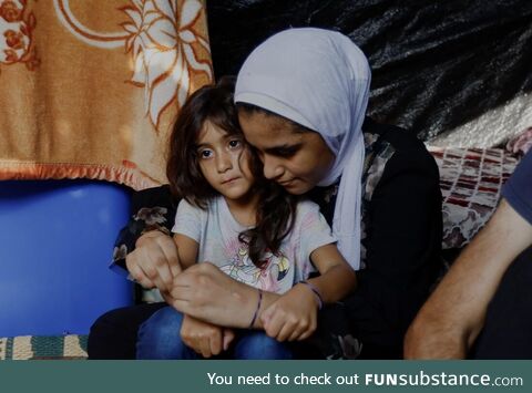 Gaza families wear ID bracelets to avoid burial in mass graves