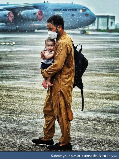 A refugee at Delhi airport, India