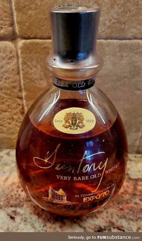Found during a move. Suntory Whiskey that's bottle-aged 54 years