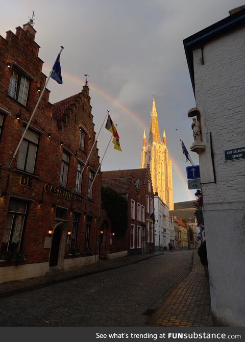 A Bruges' church with a rainbow behind it!