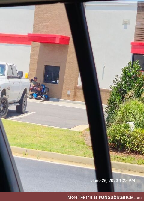 Arby's drive-thru shenanigans today at its finest. He is technically driving