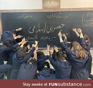 Iranian highschool girls defying the regime by not wearing hijab and showing middle