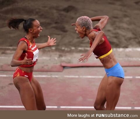 The winners of Gold and Bronze in triple jump yelling at each other in pure excitement