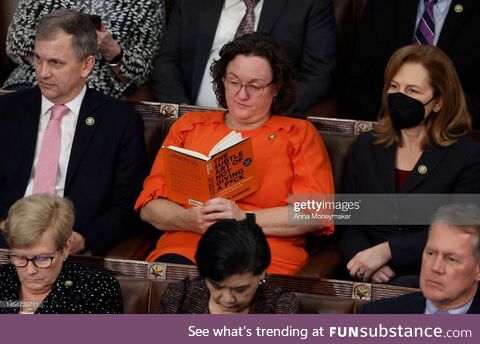 Katie Porter reading a book